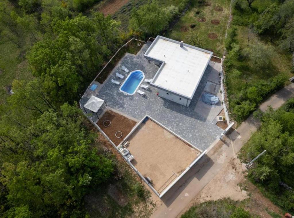 an overhead view of a house with a roof at Villa Peace Oasis in Lovreć