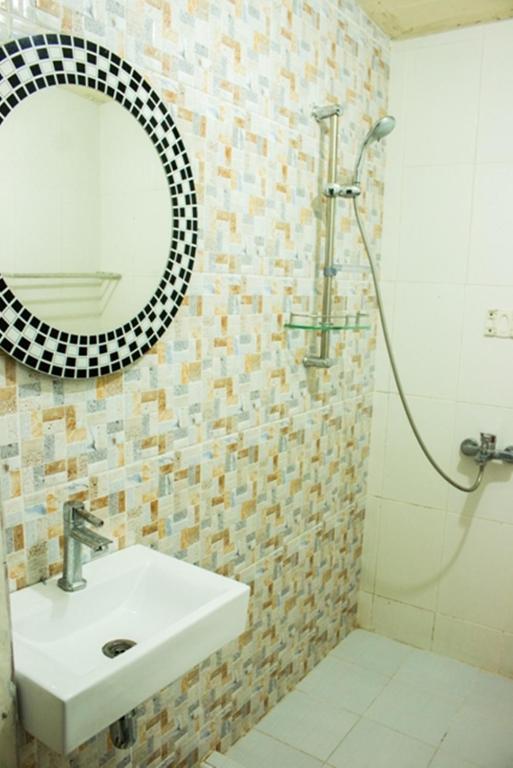 Koupelna v ubytování Hotel Alifa Syariah