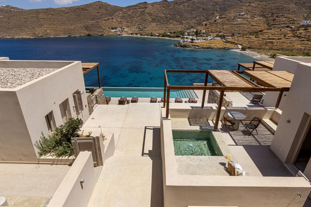 a view of a house with a swimming pool at Yfes in Kithnos