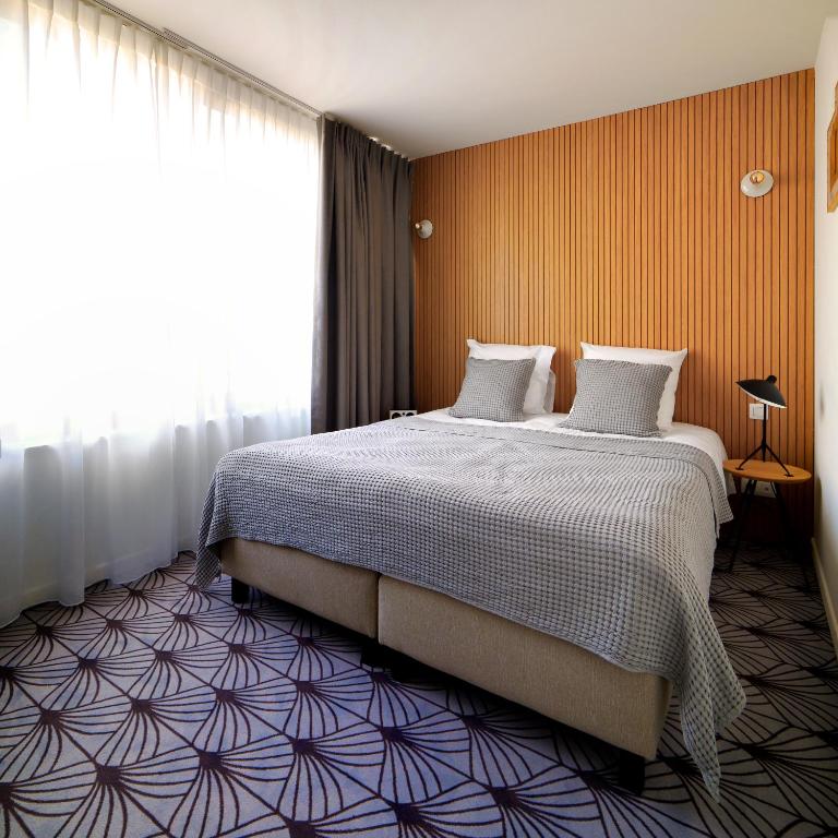 Postel nebo postele na pokoji v ubytování Vintage Hotel Brussels