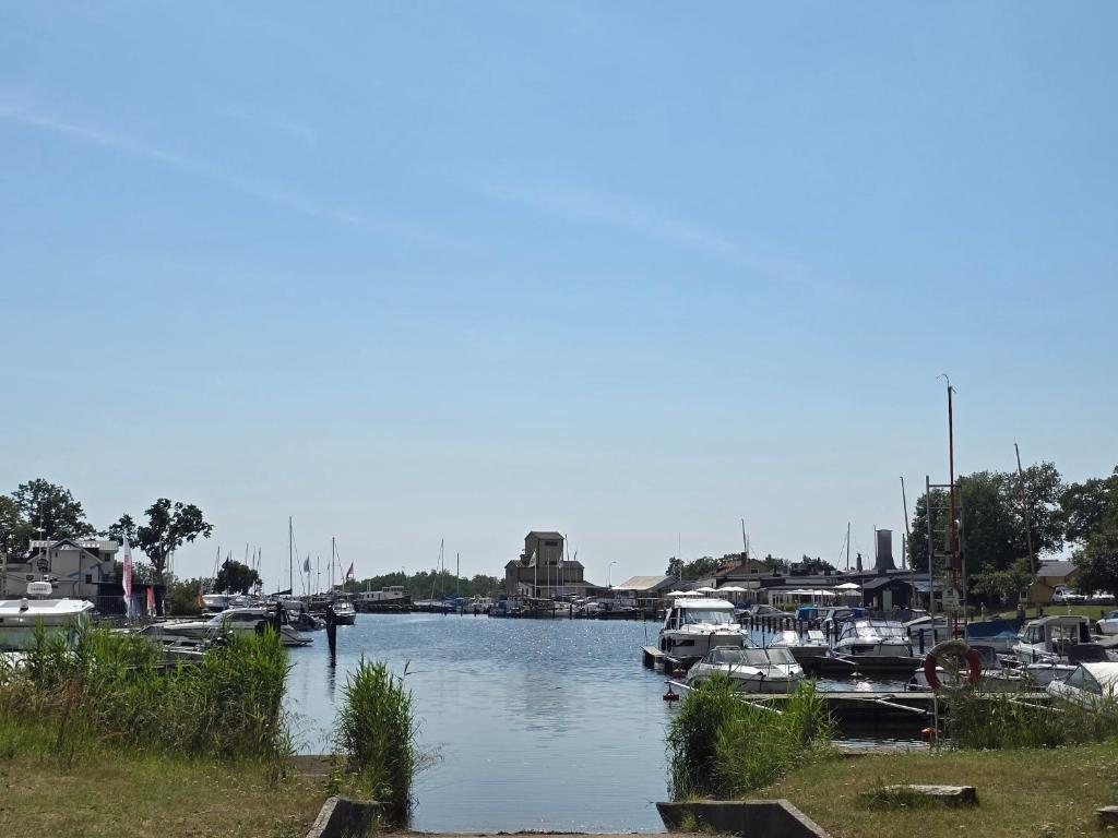 a group of boats docked in a harbor at Malenasro in Karlshamn
