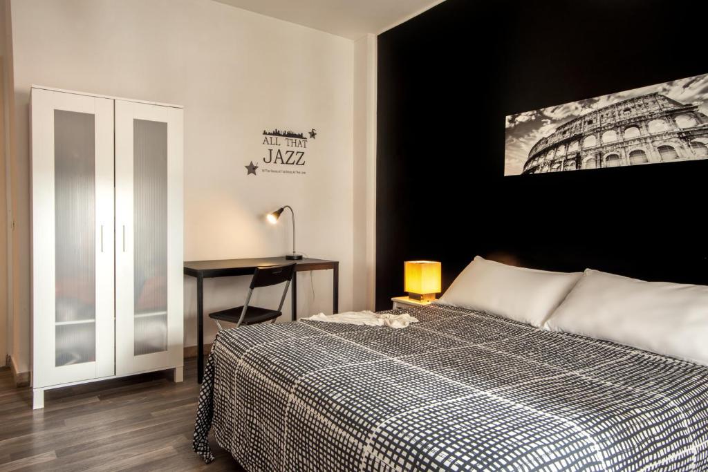 Postel nebo postele na pokoji v ubytování Radio Hotel