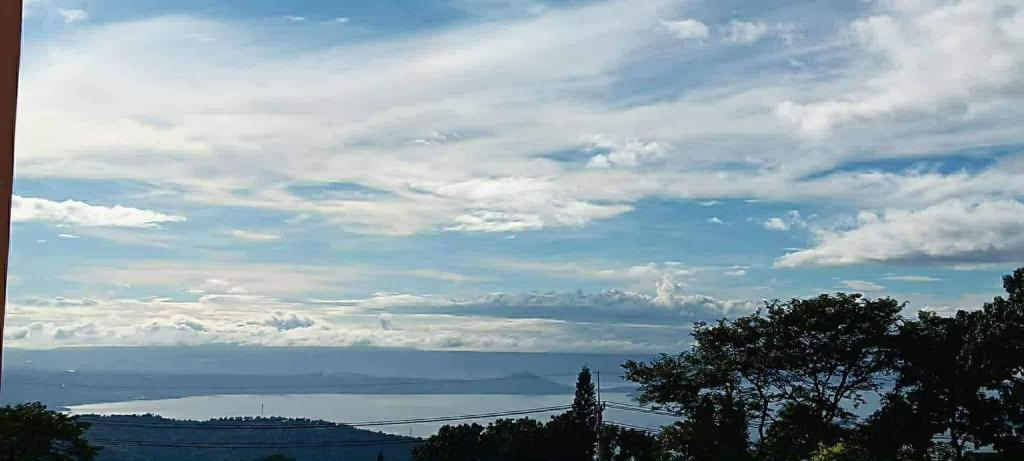 a view of a bridge over a body of water at Mi Casa in Tagaytay
