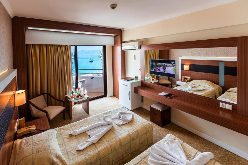 Postel nebo postele na pokoji v ubytování Derici Hotel