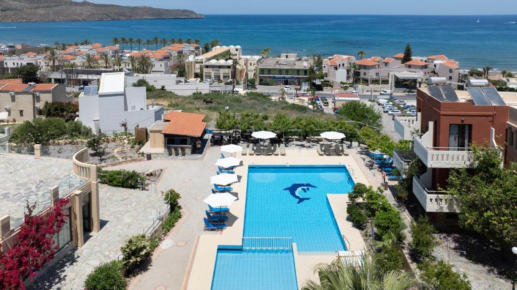 an aerial view of a resort with a swimming pool at Ekavi Apartments in Agia Marina Nea Kydonias