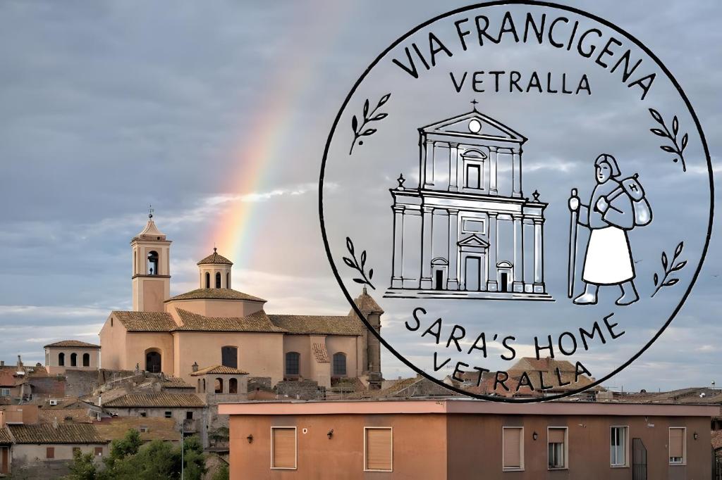 a picture of a city with a rainbow in the background at Sara's Home Vetralla in Vetralla