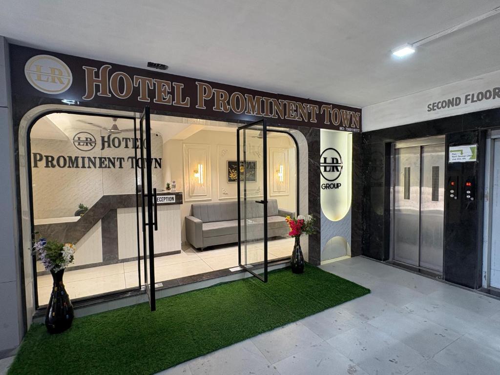 a hotel department store front with a hotel programme window at Hotel Prominent Town in Ahmedabad