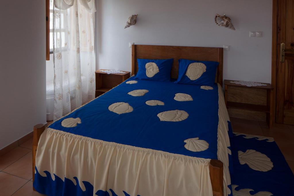 Postel nebo postele na pokoji v ubytování Casa do Zé - AL