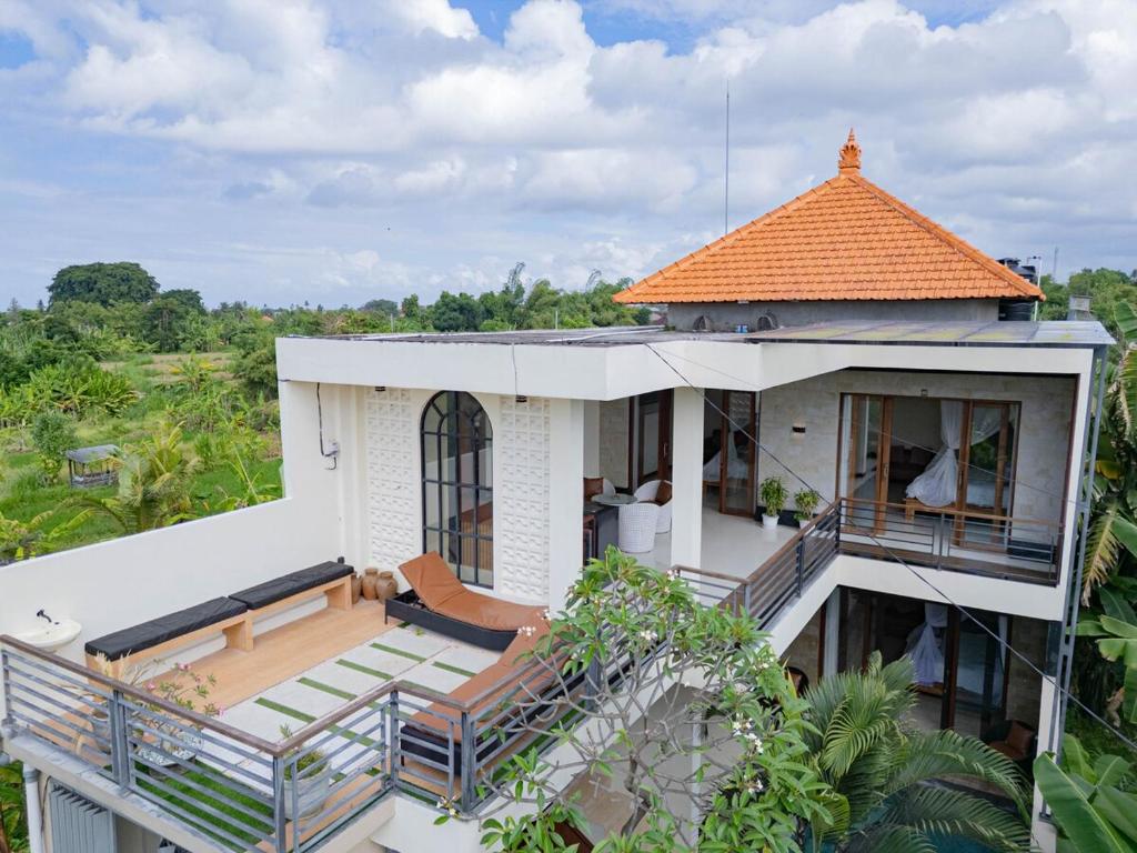 an aerial view of a house with an orange roof at D'nala Villa - 4 bedroom villa in Lebih