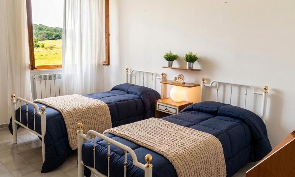VAL D'ORCIA DELUXE 1 ELEGANTE CASA immersa nel verde con WiFi, giardino e parcheggio