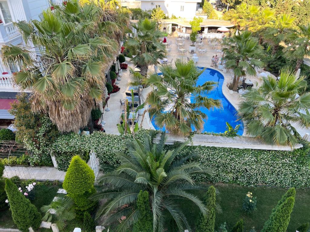 an overhead view of a resort with a swimming pool at Garden view apartment in Karpen