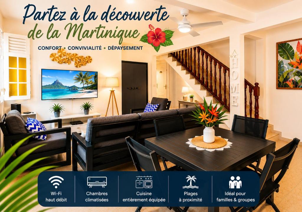 a dining room and living room with a table and chairs at Villa Coralys - Plage - Cozy in Schœlcher