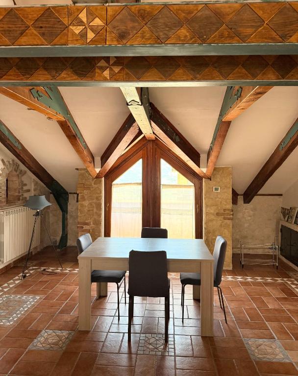 a dining room with a white table and chairs at Domus Liberty Luxury House in Sala Consilina
