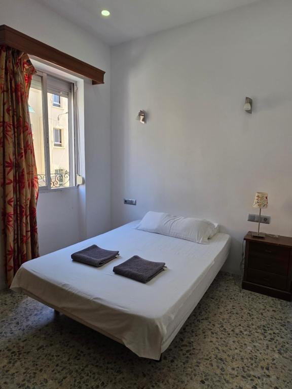 Preciosa Habitación privada comoda relajante ideal para pasar muy buenas vacaciones Wi-Fi centro malaga