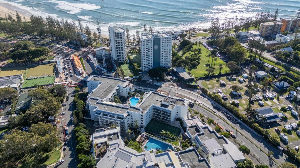 an aerial view of a city and the ocean at Swell Resort Burleigh Heads in Gold Coast