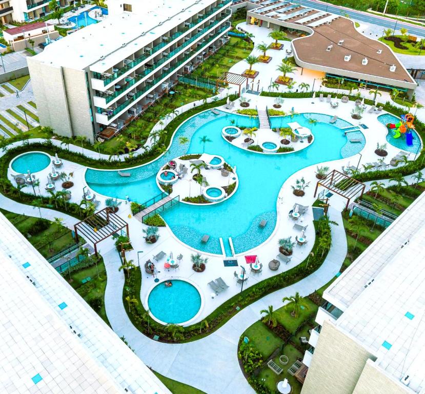 an overhead view of a pool at a resort at Beach Class Verano in Porto De Galinhas