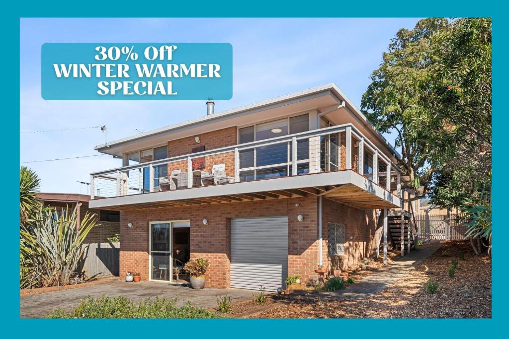 a house with the words off winter warmer special at Sienna Sunrise in Portarlington