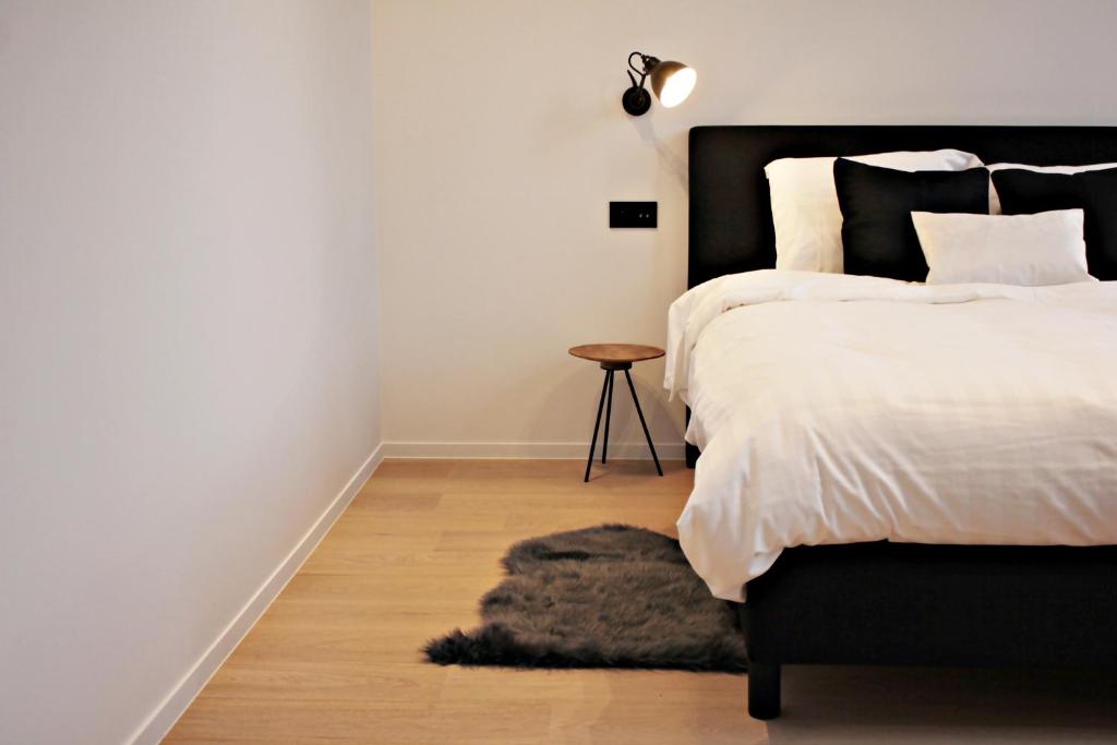Postel nebo postele na pokoji v ubytování B&B VIENNA