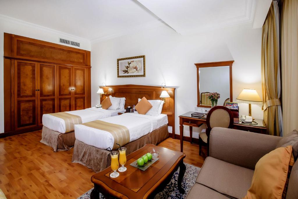 Postel nebo postele na pokoji v ubytování Grand Excelsior Hotel - Bur Dubai