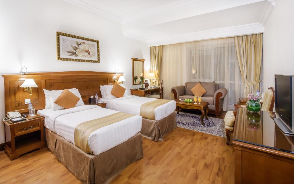 Postel nebo postele na pokoji v ubytování Grand Excelsior Hotel - Bur Dubai