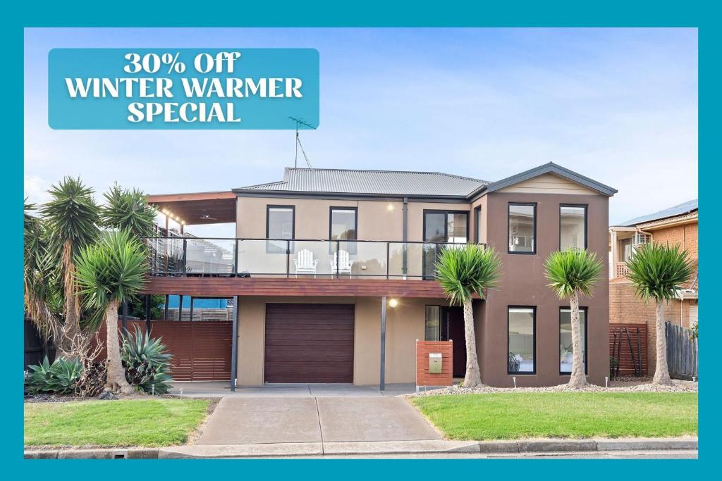a house with a sign that reads winter warmer special at Portarlington Gem in Portarlington