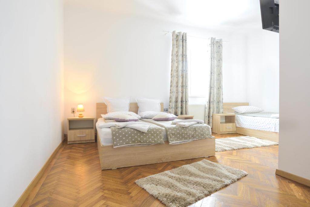 Postel nebo postele na pokoji v ubytování Pension Verona Centru
