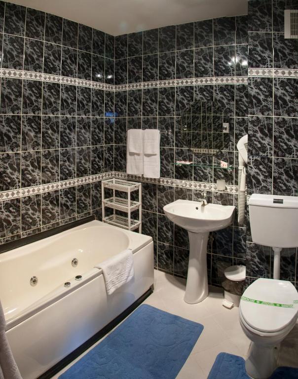 Koupelna v ubytování Hotel Kreta