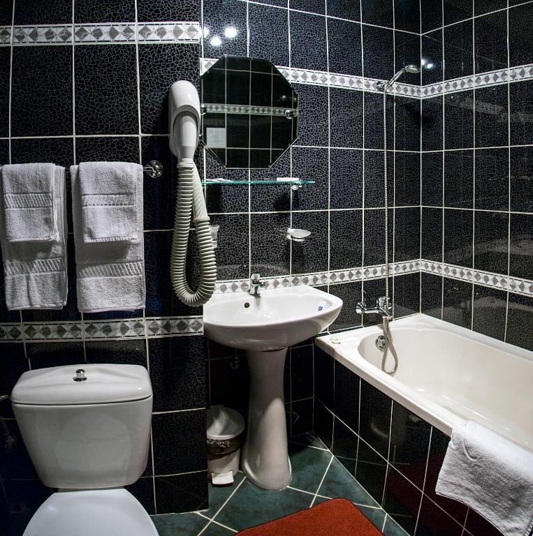 Koupelna v ubytování Hotel Kreta