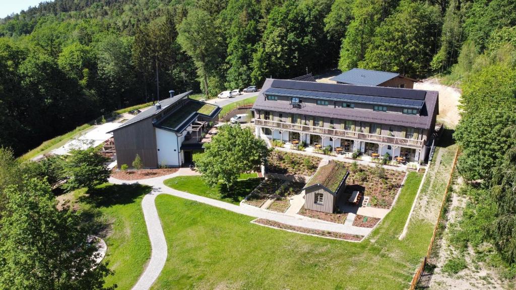 an aerial view of a large house in the forest at WALDGUT Naturresort in Bad Gottleuba