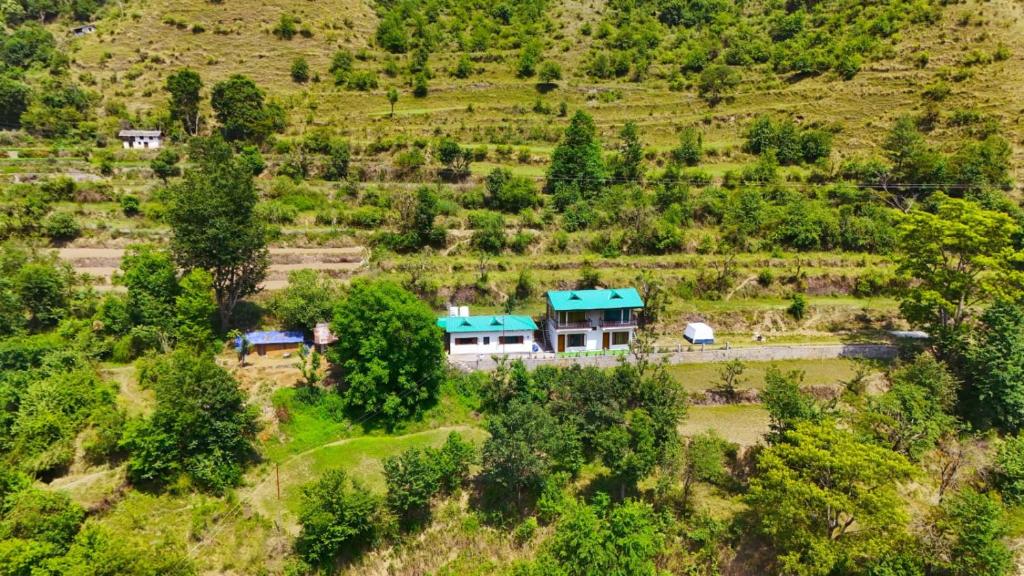 an aerial view of a house on a hill at Kabila King Resort in Chakrāta