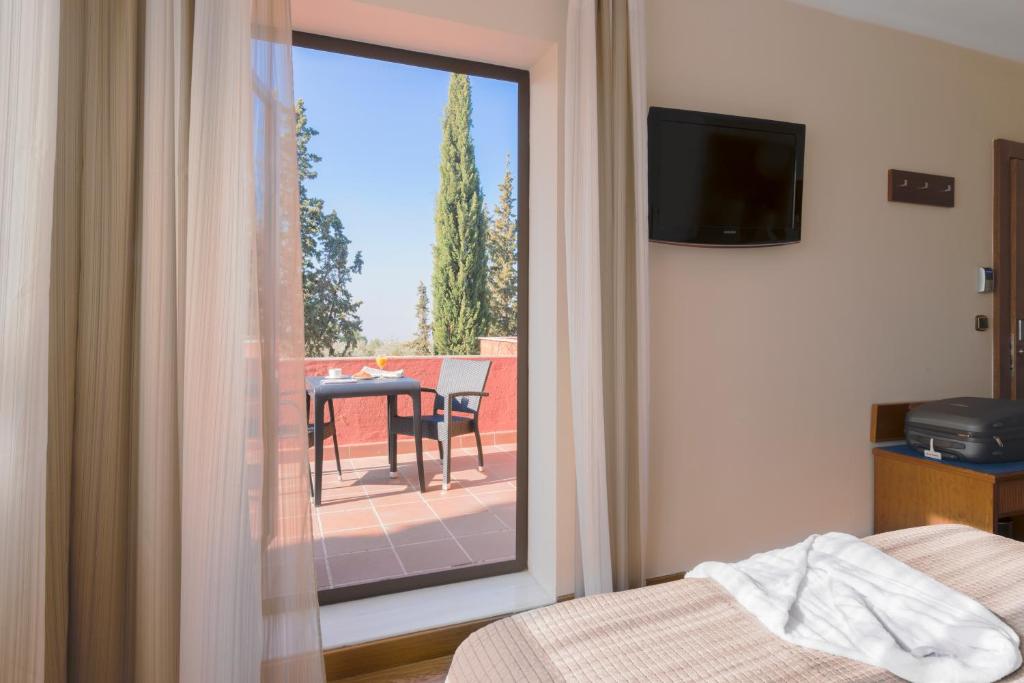 Postel nebo postele na pokoji v ubytování Porcel Alixares