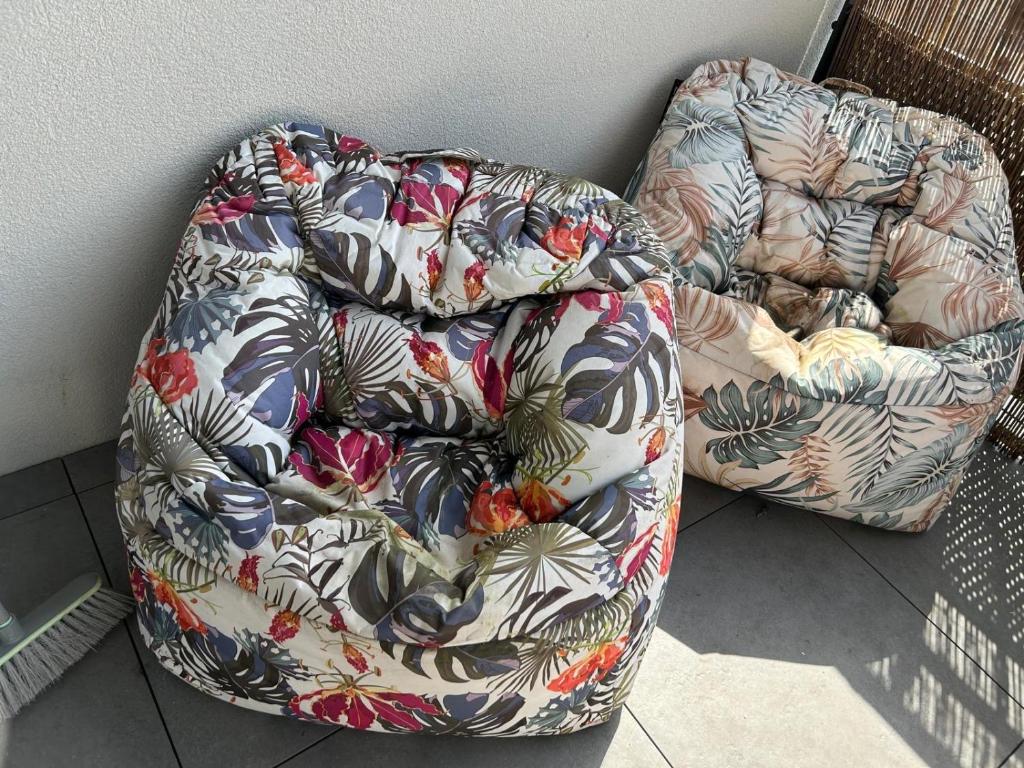 a couch sitting next to a wall at L'instant coloc in Oullins
