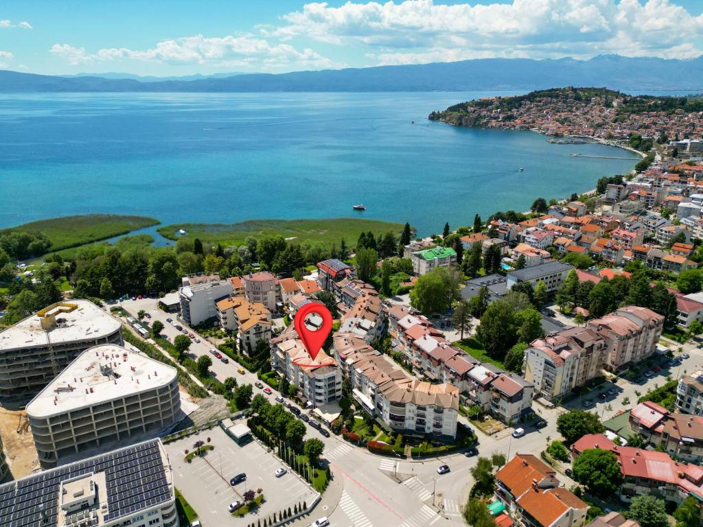 an aerial view of a city and a body of water at Villa Apollo Ohrid Lakeside in Ohrid
