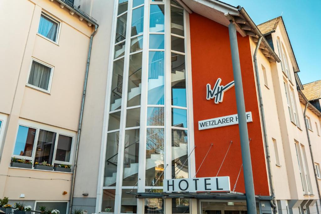 a building with a hotel sign in front of it at Wetzlarer Hof Hotel & Restaurant in Wetzlar