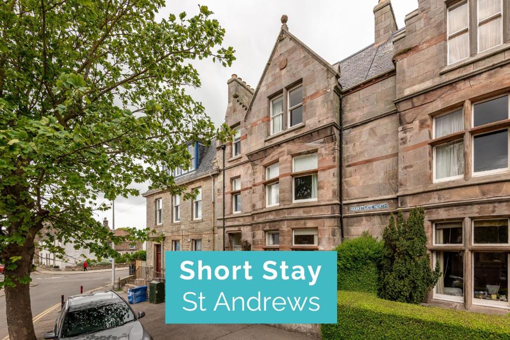 an old building with the words short stay st amyris at Hazelton Townhouse - Crail in Crail