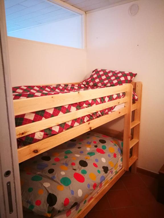Postel nebo postele na pokoji v ubytování Dolomiti Di Brenta
