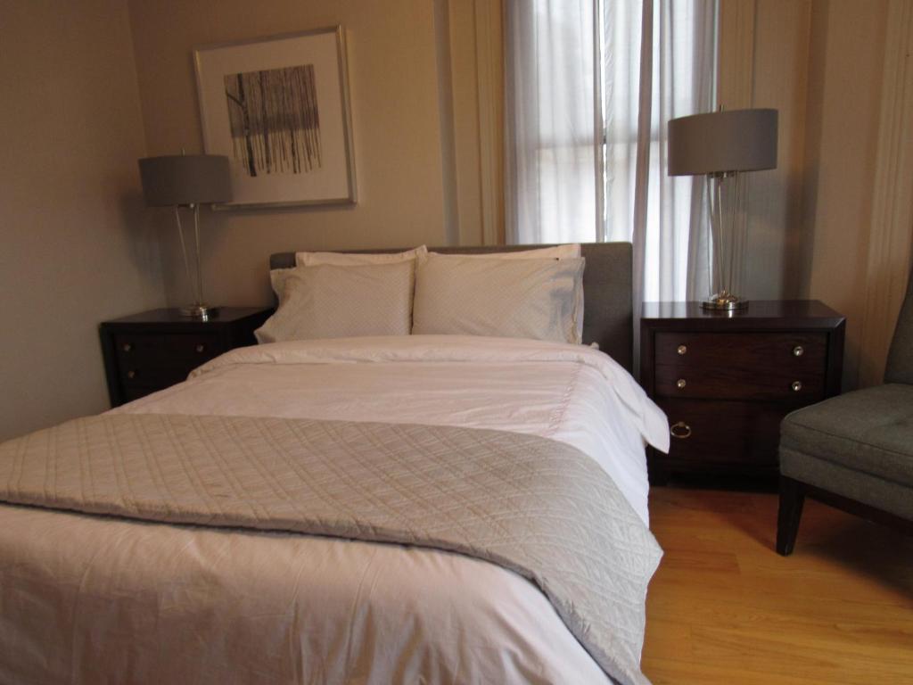 Postel nebo postele na pokoji v ubytování Washington Park Inn