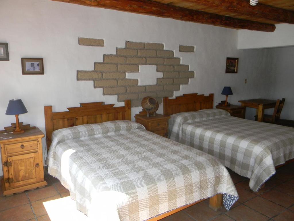 Postel nebo postele na pokoji v ubytování La Troje de Adobe