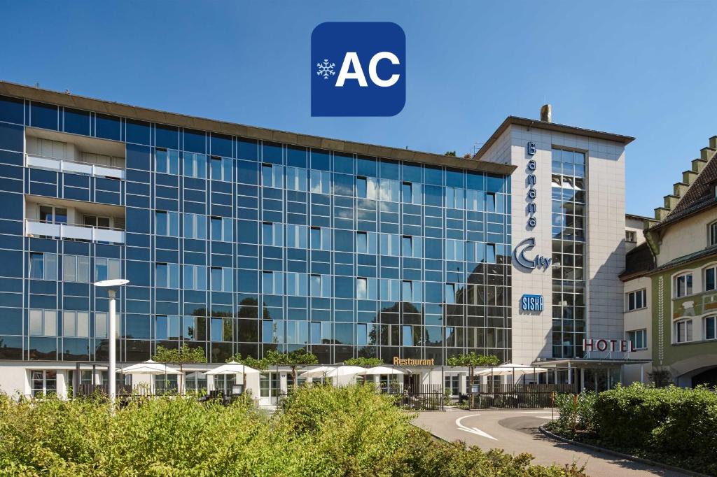an office building with the ac logo on it at Hotel Banana City Winterthur in Winterthur
