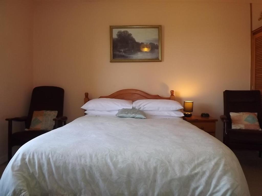 Postel nebo postele na pokoji v ubytování Glenavon Homestay