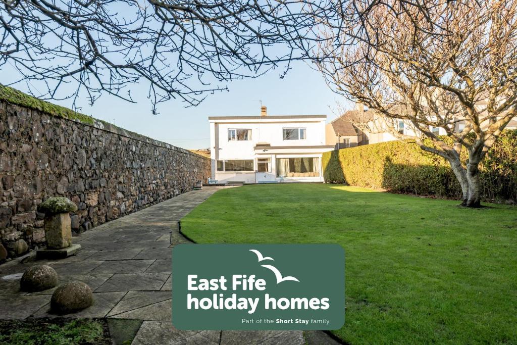 an image of a house with the east fire holiday homes logo at Kingsmuir - Elie in Earlsferry
