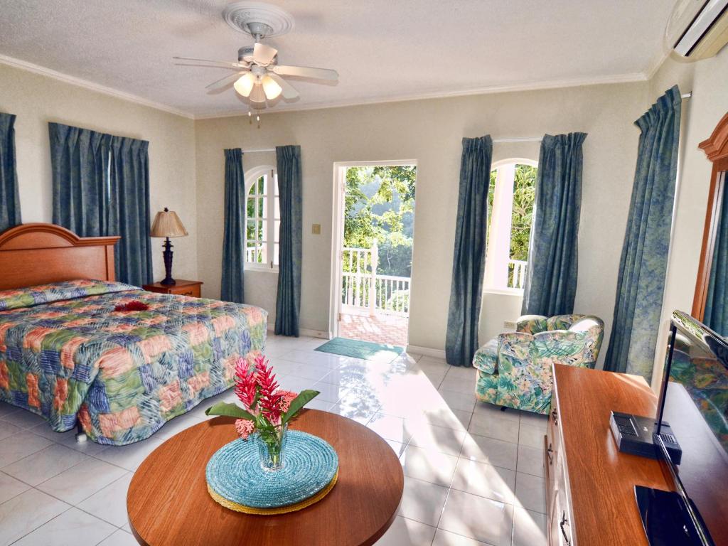 Letto o letti in una camera di Tropical Lagoon Resort