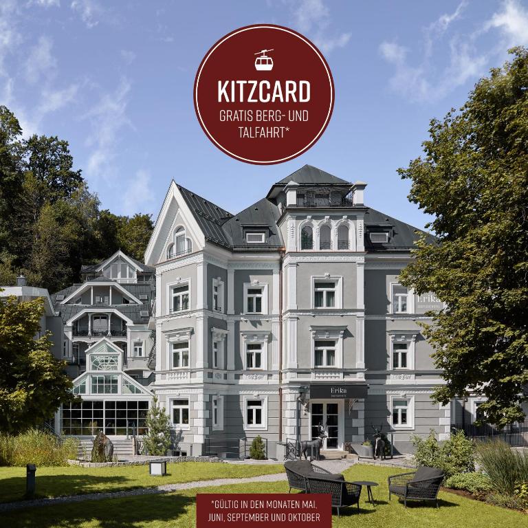 a building with a sign in front of it at ERIKA Boutiquehotel Kitzbühel in Kitzbühel