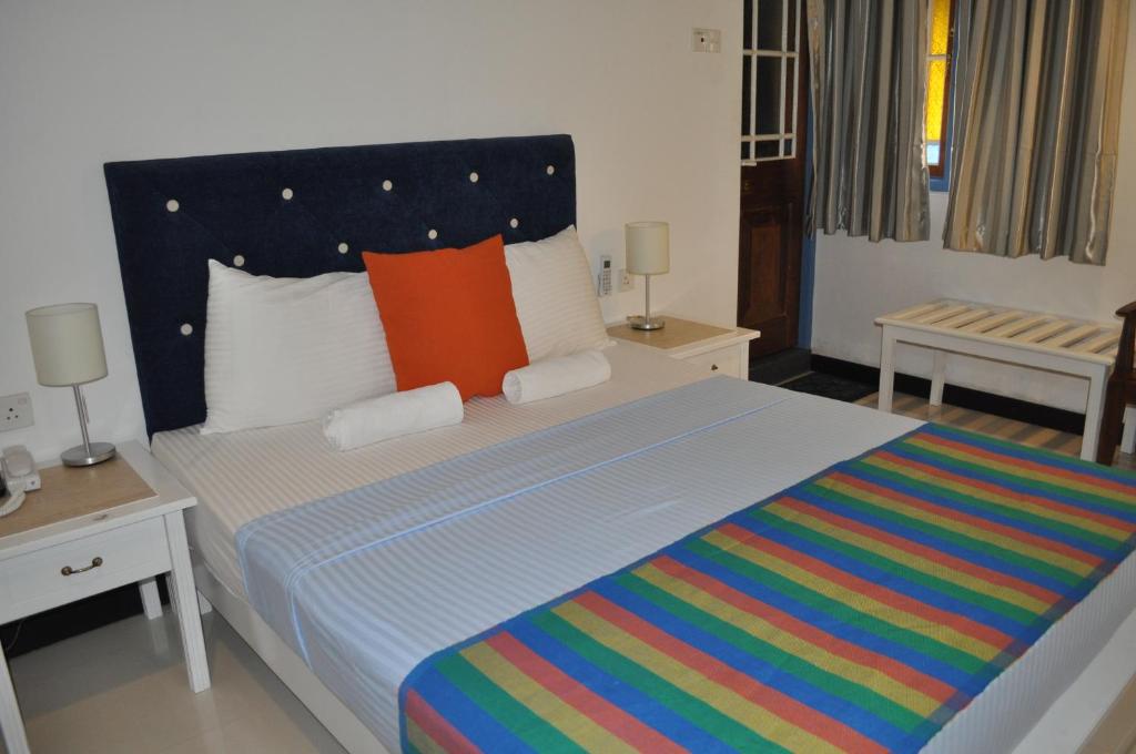 Postel nebo postele na pokoji v ubytování Villa 92 City Stay