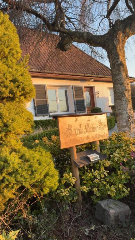 a sign in a yard in front of a house at Au rucher in Fressin
