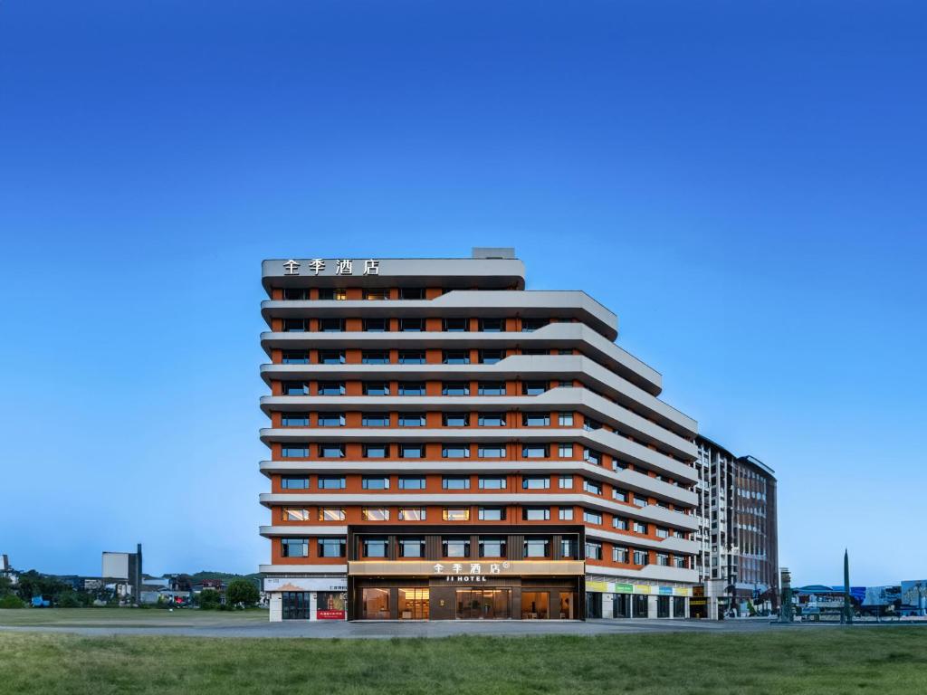 a rendering of a building at Zhangjiajie JI Hotel- New hotel, Free pick up service, Free shuttle service for Tianmen Mount Cableway, Smart Hotel&Root Service,King Koil mattress, Free self-service laundry,Toursim Service&English Customer Service in Zhangjiajie