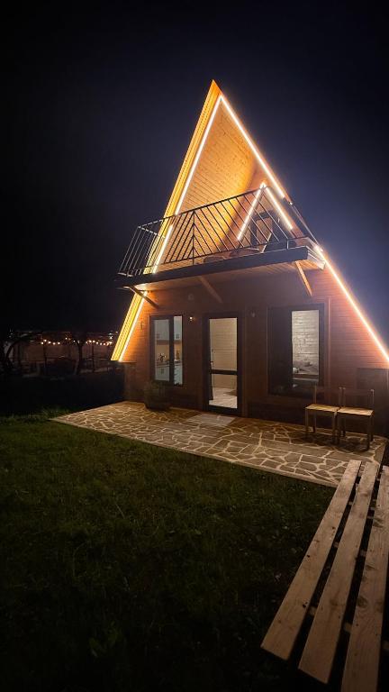 a house with a light on top of it at night at Dsegh Eco Home in Dsegh