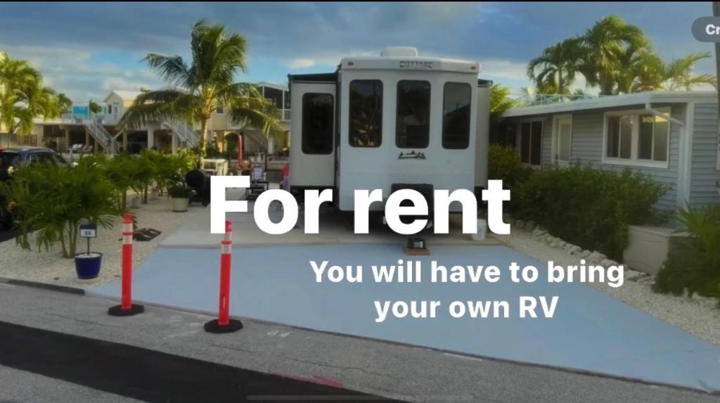 a sign that reads for rent you will have to bring your own rv at Rv Lot in Paradise in Cudjoe Key