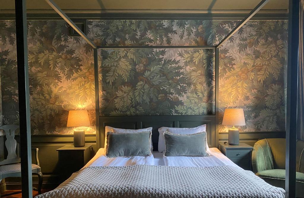 Säng eller sängar i ett rum på Hotel Jämteborg