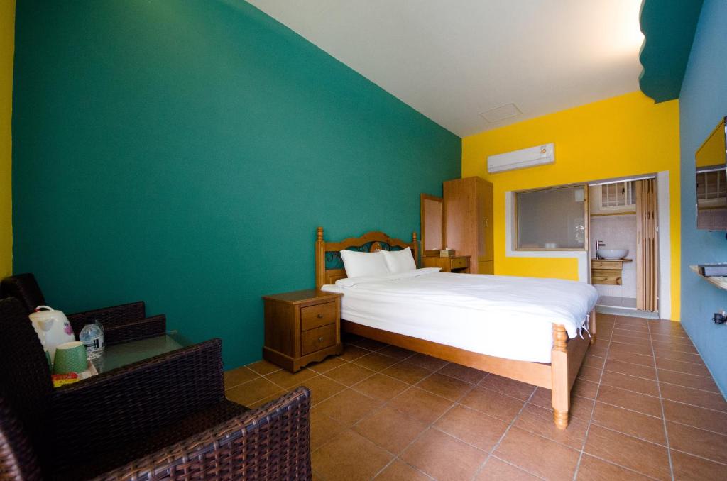 Postel nebo postele na pokoji v ubytování Baisha 31 B&B